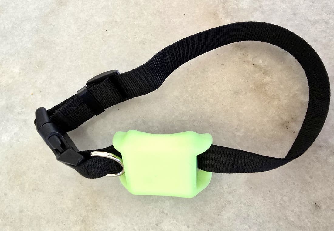 marlaio MX1 in its silicone case on a collar strap.